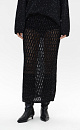 Ажурная юбка длины миди из хлопка с добавлением вискозы. Модель по фигуре, с широким эластичным поясом в рубчик. Изделие декорировано голографическими пайетками. Без подкладки. 