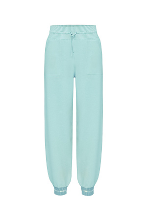 ментол Вискозные спортивные брюки с карманами. Модель с широким эластичным поясом на кулиске и манжетами на резинке.