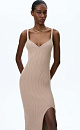 Трикотажное платье длины миди из вискозы. Модель по фируге, на тонких бретельках, с вывязанным фактурным лифом и высоким разрезом спреди. Изделие выполнено в широких рубчик.