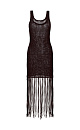 Трикотажный ажурный сарафан из 100% хлопка. Модель свободного кроя, без рукавов, на широких бретельках и U-образным вырезом. Изделие декорировано длинной бахромой.