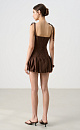Платье длины мини из 100% льна с юбкой-баллон. Модель приталенного силуэта, с корсетным верхом, на тонких бретельках, декорированных крупными бусинами. Спинка изделия выполнена на резинке. 