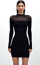 Трикотажное платье длины мини из вискозы в рубчик. Модель приталенного силуэта, с длинными рукавами и воротником-стойкой. Верх изделия выполнен из тонкой пряжи, создавая акцент на зону плеч.