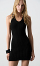 Платье длины мини из фактурного трикотажа на основе вискозы. Модель приталенного силуэта, без рукавов, на широких бретельках, с U-образным вырезом горловины. Изделие выполнено в широкий рубчик. 