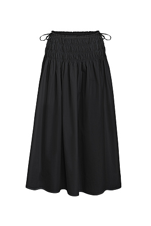 черный Юбка длины миди из хлопка. Модель свободного силуэта, с эластичными сборками и кулиской на поясе. 
