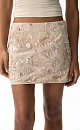 Юбка длины мини с цветочным орнаментом, вышитым пайетками и бисером. Застежка на потайную молнию. Изделие выполнено на подкладке.