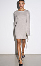 Трикотажное платье длины мини из вискозы с добавлением люрекса. Модель свободного силуэта с круглой горловиной и длинными рукавами. Края изделия декорированы валиком.