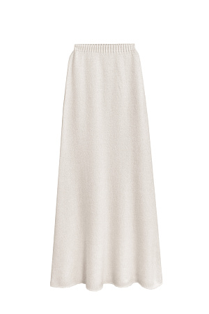 молочный Трикотажная юбка длины макси из пуха лисы. Модель А-силуэта, с эластичным поясом на резинке и валиком по низу подола. Дополнить образ можно джемпером в таком же стиле.