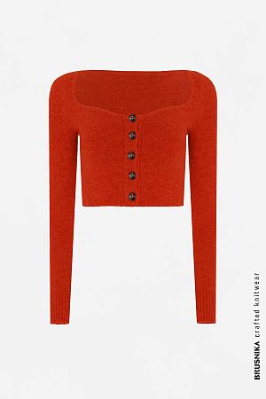 оранжевый Трикотажный укороченный топ из буклированной пряжи. Модель приталенного силуэта с планкой на пуговицах. Дополнить образ можно юбкой в таком же стиле.