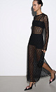 Платье длины макси из легкого кружева. Модель свободного силуэта с длинными рукавами, круглой горловиной и высоким разрезом на подоле. Изделие выполнено без подкладки. 