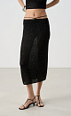 Трикотажная юбка длины миди из хлопка с добавлением вискозы. Изделие декорировано мелкими пайетками. Модель прямого кроя с акцентной деталью в виде тонкого пояса. Без подкладки.