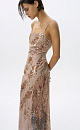 Платье с пайетками на тонких бретелях. Модель приталенного силуэта длины макси с вырезом на спине и застежкой на молнию. 