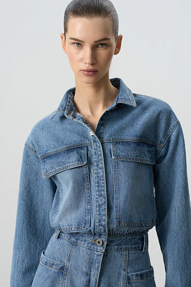 Джинсовый комбинезон с большими карманами