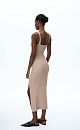 Трикотажное платье длины миди из вискозы. Модель по фируге, на тонких бретельках, с вывязанным фактурным лифом и высоким разрезом спреди. Изделие выполнено в широких рубчик.