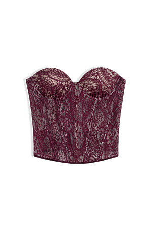 бордовый Корсет из тонкого кружева на контрастной подкладке с чашечками и шнуровкой по спинке. Дополнить образ можно юбкой в таком же стиле.