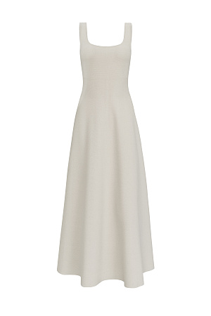 бежевый Трикотажное платье длины миди из плотной вискозы. Модель без рукавов, на широких бретелях и юбкой А-силуэта. Застежка на молнию сзади.