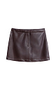 Юбка длины мини из экокожи. Модель выполнена на подкладке. Застежка на молнию, скрытые пуговицу и крючок.