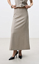 Юбка длины макси из шерсти. Модель А-силуэта со шлевками для ремня и застежкой на молнию сбоку. Дополнить образ можно жилетом и жакетом.