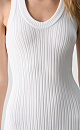 Платье длины мини из фактурного трикотажа на основе вискозы. Модель приталенного силуэта, без рукавов, на широких бретельках, с U-образным вырезом горловины. Изделие выполнено в широкий рубчик. 