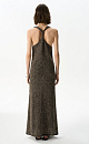Трикотажный сарафан длины макси из хлопка с пайетками. Модель свободного кроя, на широких бретелях с перекрутом на спине и глубоким U-образным вырезом. 